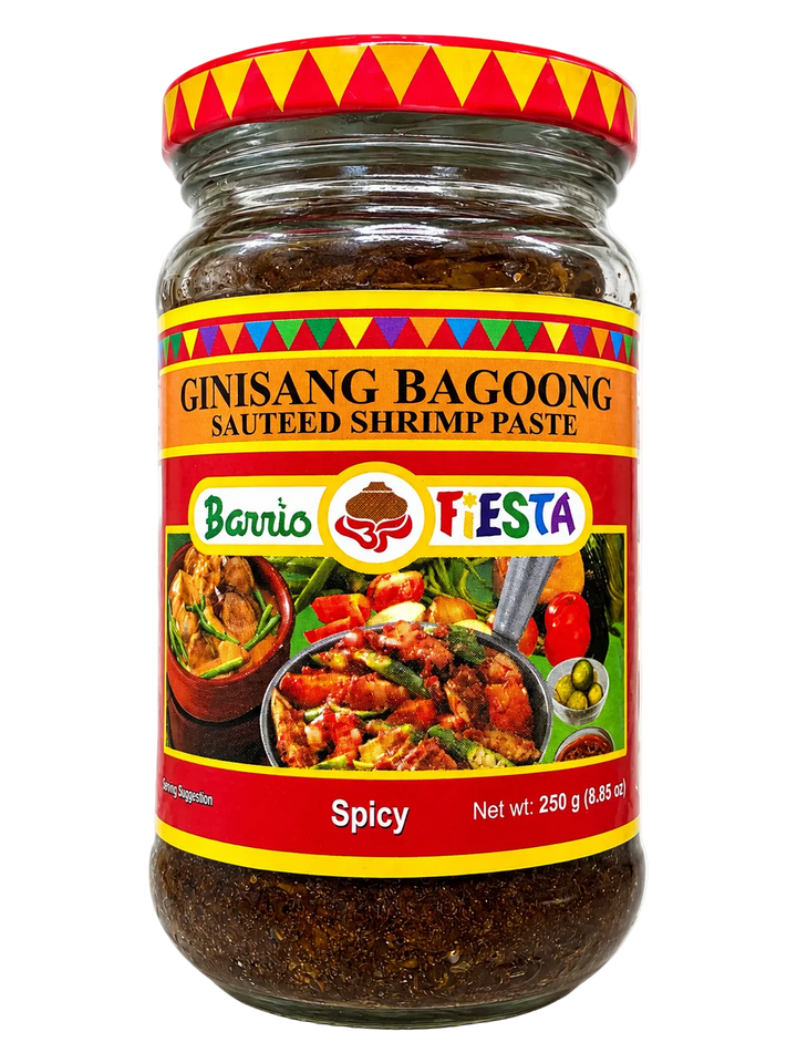 A jar of Barrio Fiesta Ginisang Bagoong Spicy sauteed shrimp paste on a white background.