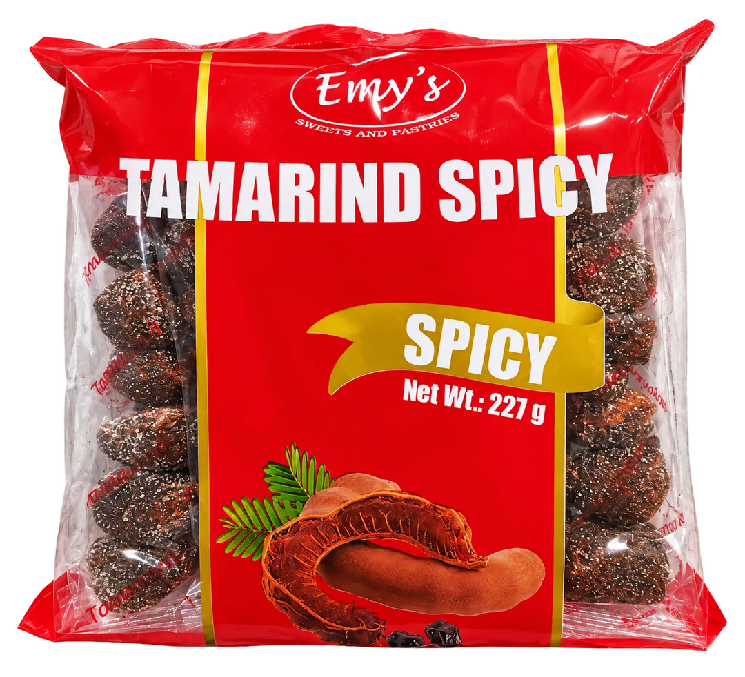 Emy's Tamarind Spicy sweets in a 227g clear plastic bag with a bright red label, showing the dark brown tamarind candies inside.