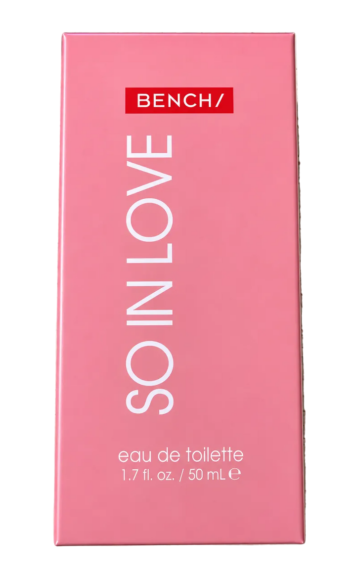 BENCH/ So In Love Eau de Toilette 50 mL (1.7 fl. oz.) perfume in a pink rectangular box featuring the BENCH/ logo and vertical white “SO IN LOVE” lettering on the front packaging.