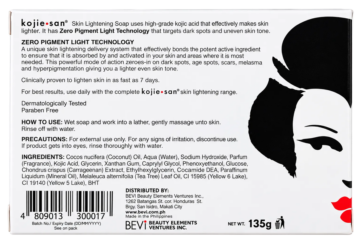 Back of a Kojie-san skin lightening soap package showing product information, ingredients, warnings, and a large black abstract shape on a white background.