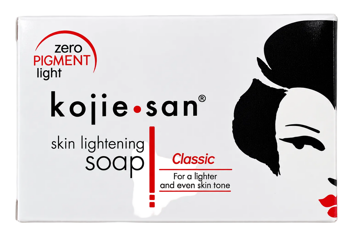 Kojie San Classic Skin Lightening Soap box, featuring a white background with a black stylized woman's face, red lips, and red and black text.