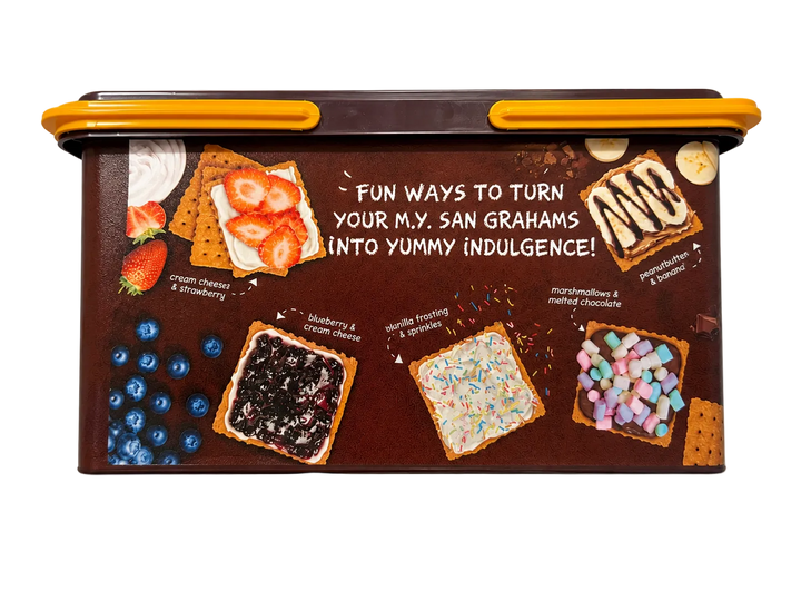 A rectangular brown box with a lid, featuring a colorful printed design of M.Y.