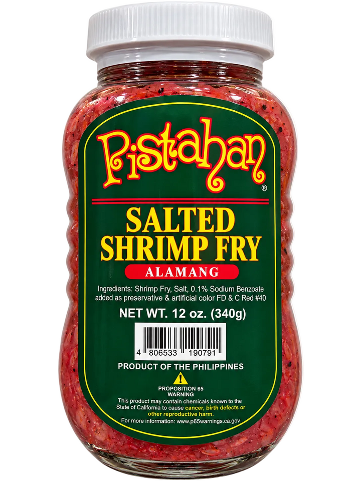 Pistahan Salted Shrimp Fry (Alamang) 12 oz (340g) in a clear glass jar with a white screw-top lid, featuring a dark green product label and reddish shrimp paste against a clean white background.
