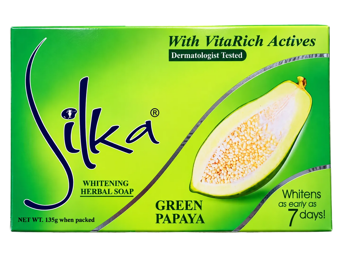 Front view of Silka Green Papaya Whitening Herbal Soap 135g, featuring green packaging with a sliced green papaya illustration, VitaRich Actives, dermatologist-tested formula, and a whitening claim of as early as 7 days