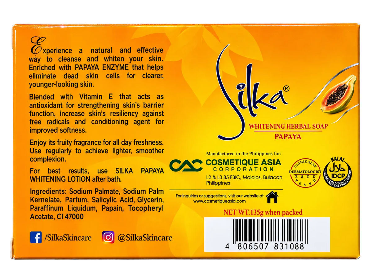 Back view of Silka Papaya Whitening Herbal Soap 135g in orange and yellow packaging, showing papaya enzyme and Vitamin E benefits, product ingredients, usage instructions, manufacturer details, certification seals, and barcode.