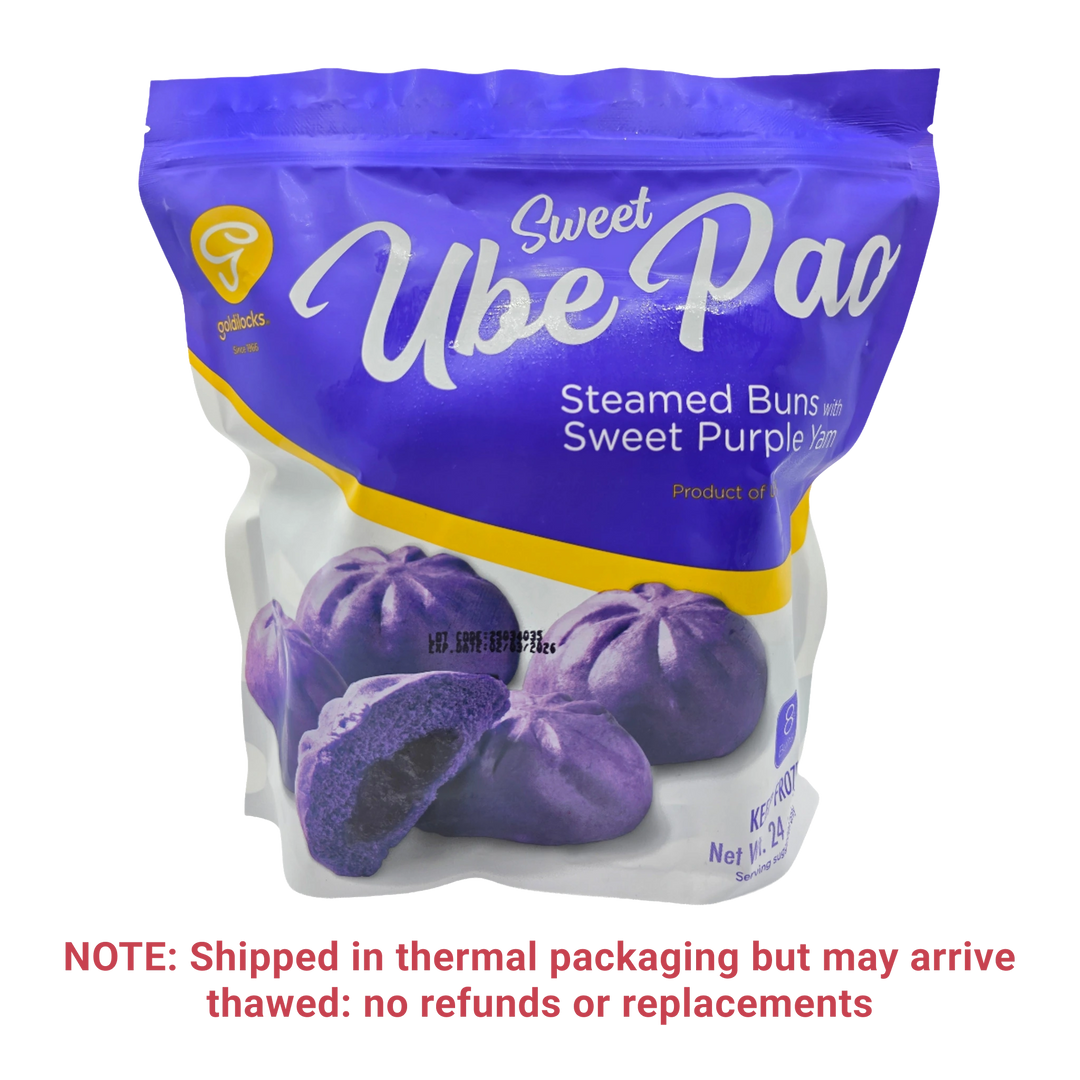 A bag of Sweet Ube Pao Steamed Buns with Sweet Purple Yam flavor, featuring a blue and white package with a photo of purple buns. A red shipping note is printed below the package on a transparent background.
