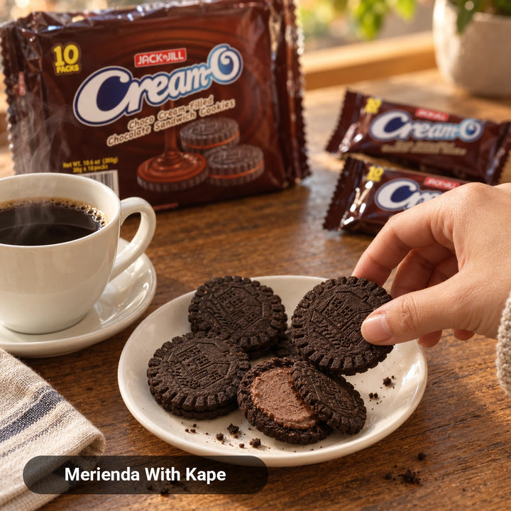 Jack n Jill Cream-O Choco sandwich cookies on a plate with coffee, one open showing chocolate cream, Merienda With Kape