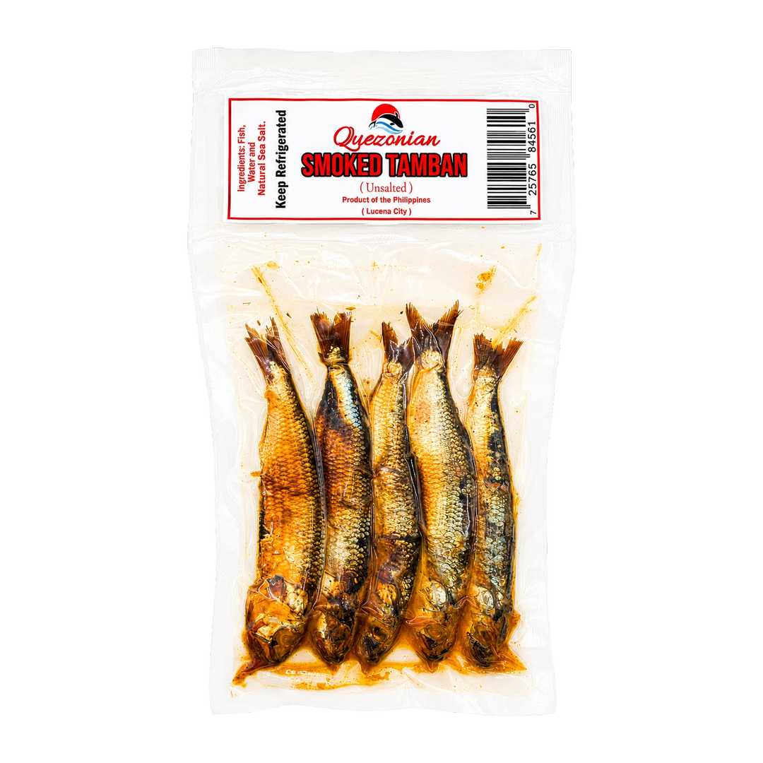 Five smoked tamban fish in a clear plastic bag with a white and red Quezonian label, on a transparent background.