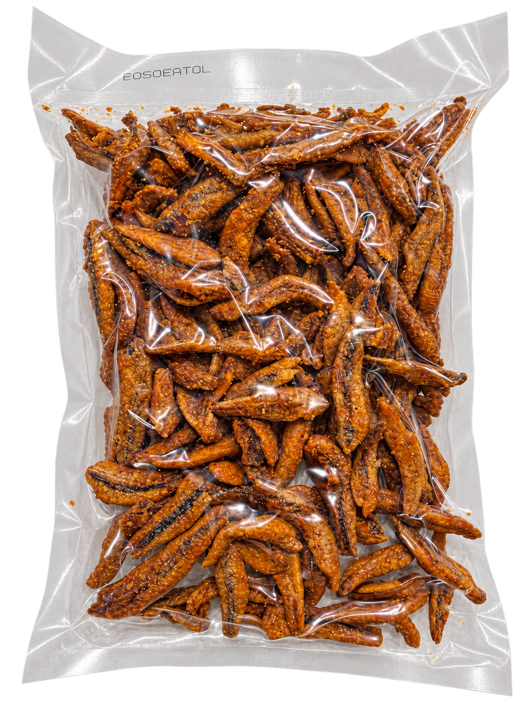 A clear plastic bag filled with roasted, reddish-brown snack pieces, photographed on a plain white background. The bag has a printed brand name near the top edge.