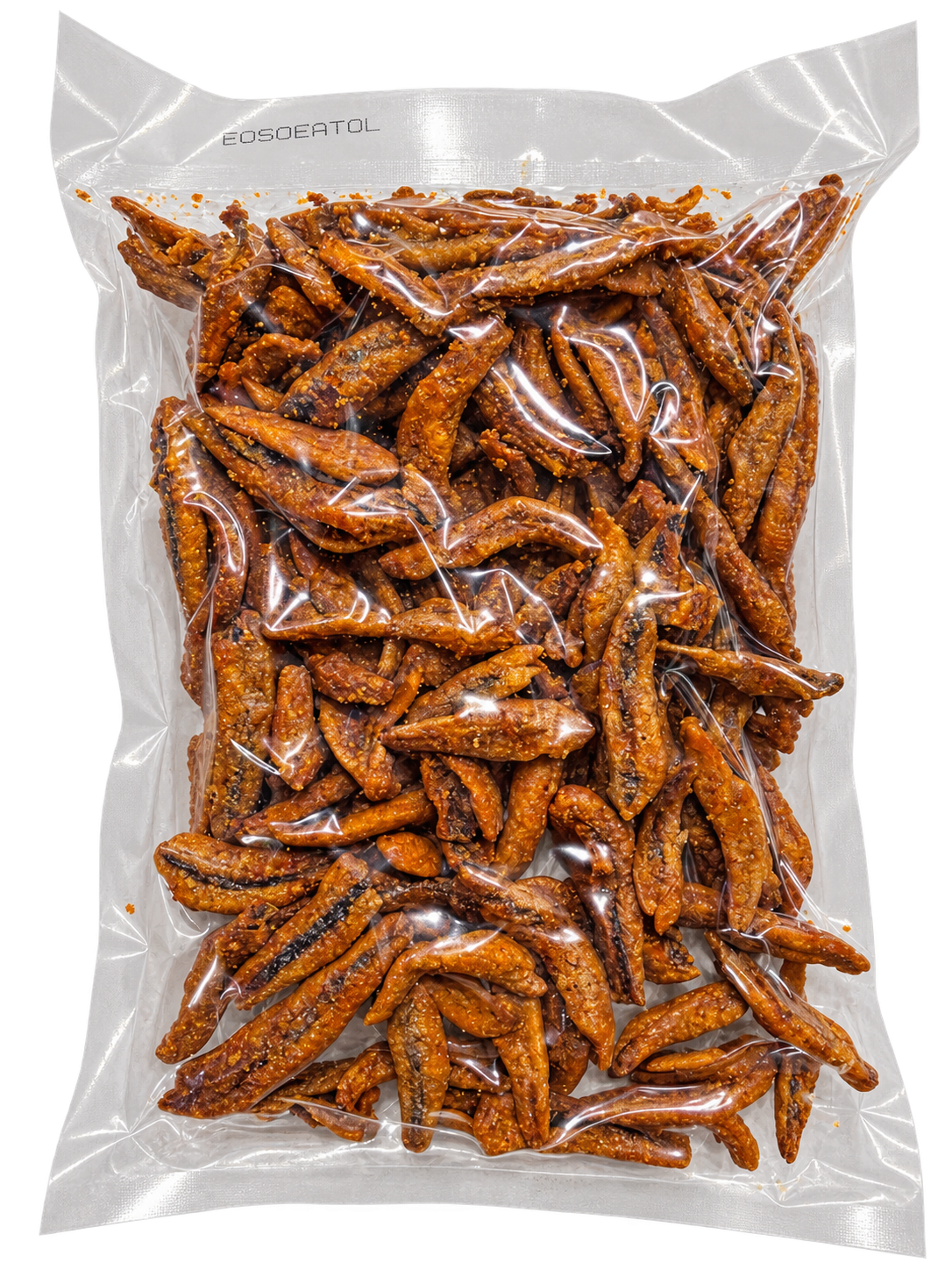 A clear plastic bag filled with roasted, reddish-brown snack pieces, photographed on a plain white background. The bag has a printed brand name near the top edge.