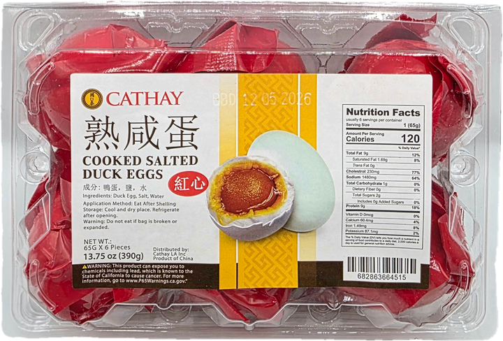 Packaged CATHAY cooked salted duck eggs with label showing nutrition facts and product details.
