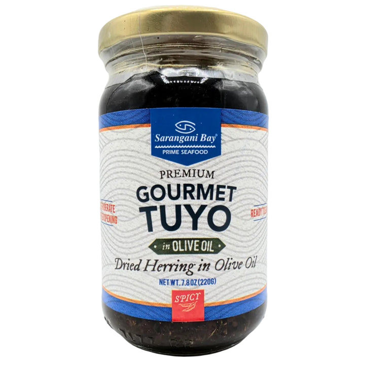 Jar of gourmet Tuyo in olive oil spicy on a white background