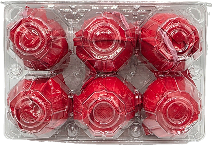 Six red roses in a clear plastic packaging tray
