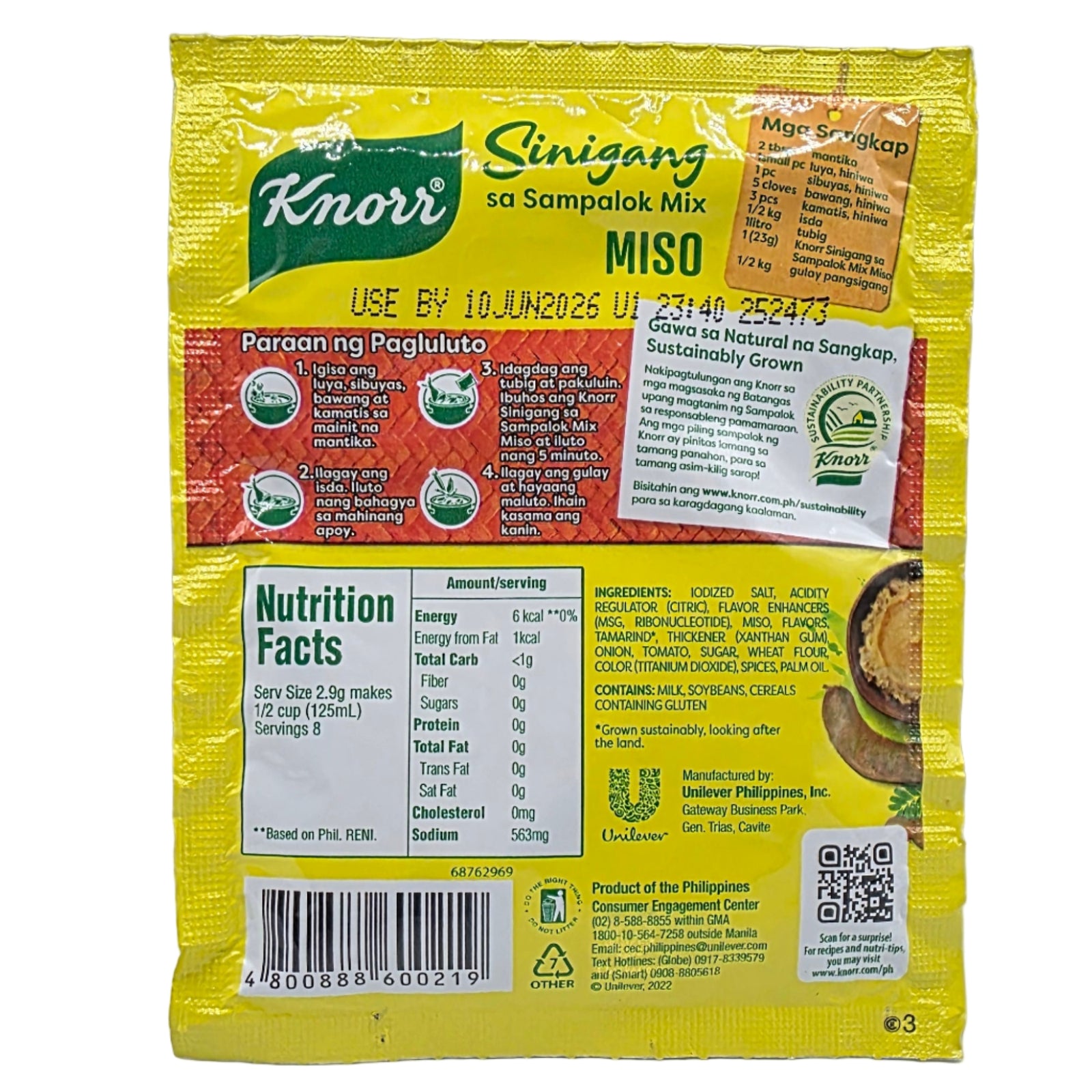 Yellow package with multiple labels on a white background