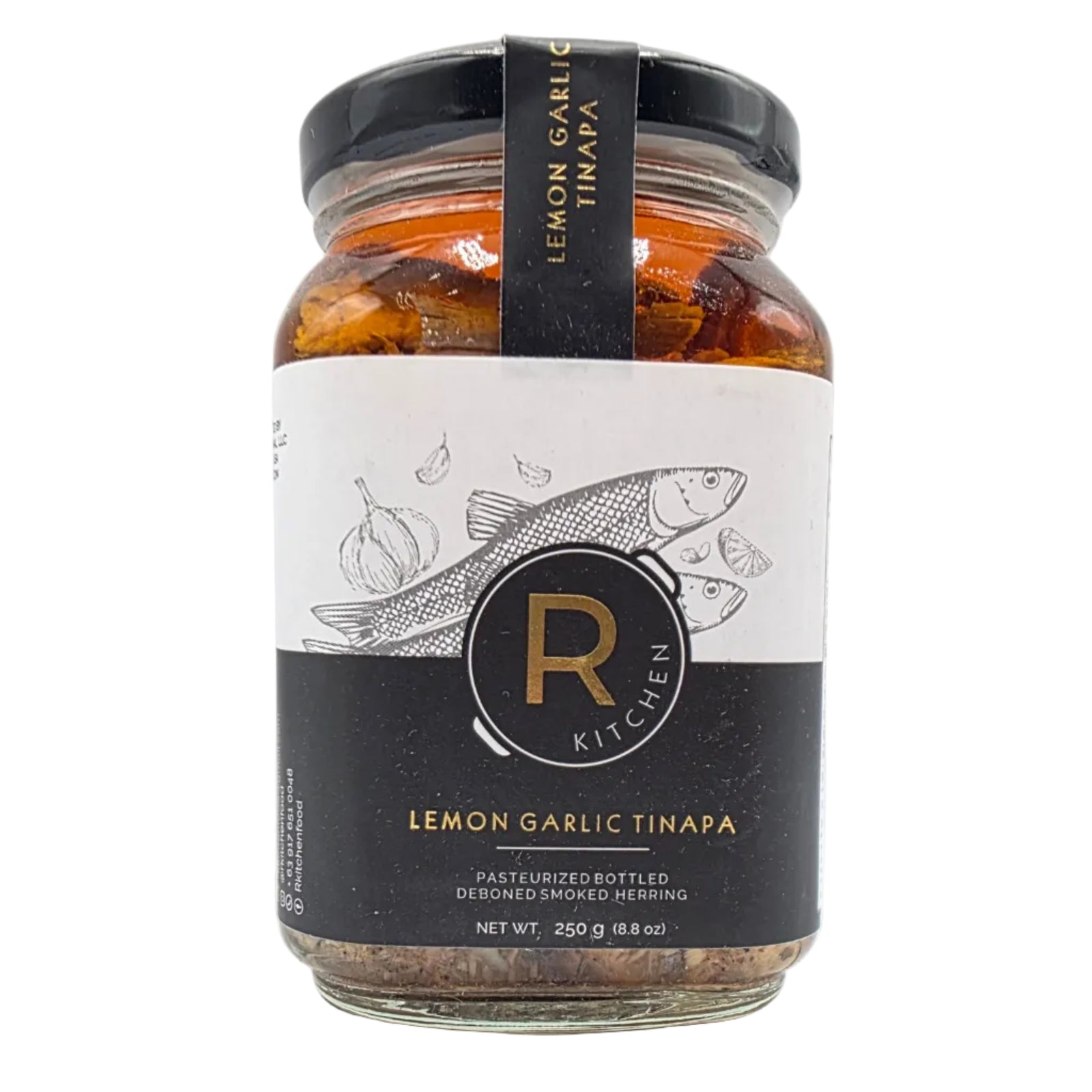 Jar of lemon garlic timbaal with a black label on a white background