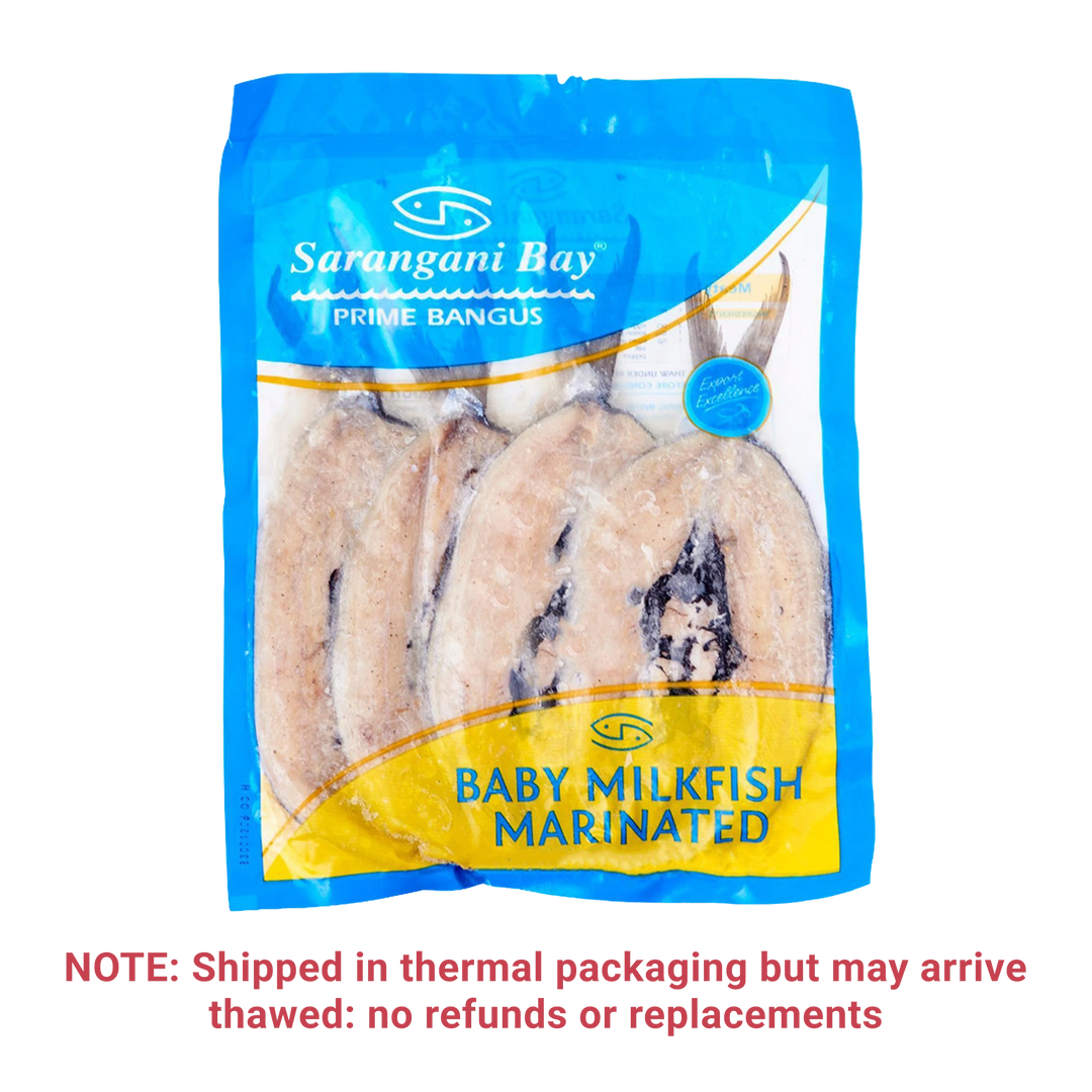 Packaged frozen baby milkfish with marinated seasoning in a clear plastic bag with blue and yellow branding for Sarangani Bay.